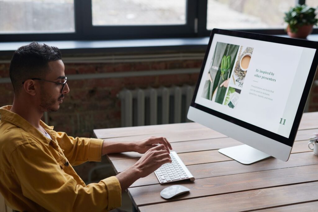 Professional working at a computer in a modern office, illustrating WordPress trends in 2026